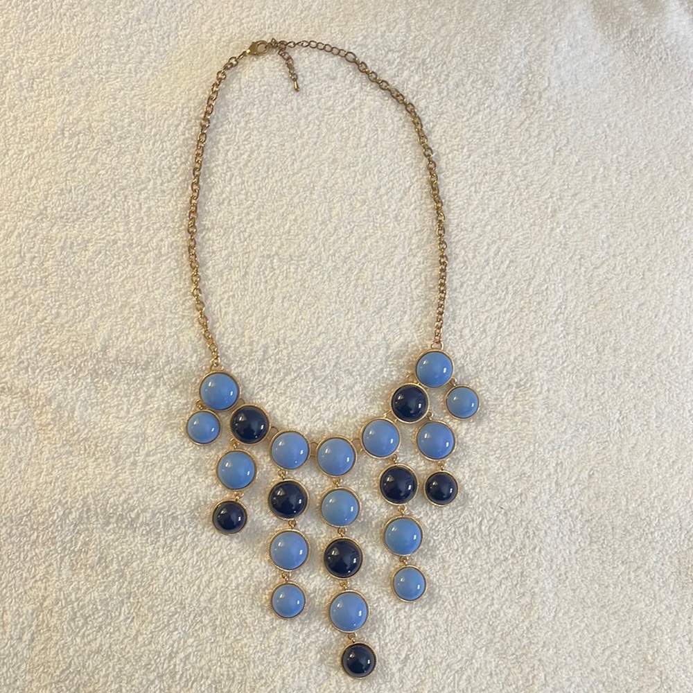 Navy and light blue gold toned necklace.